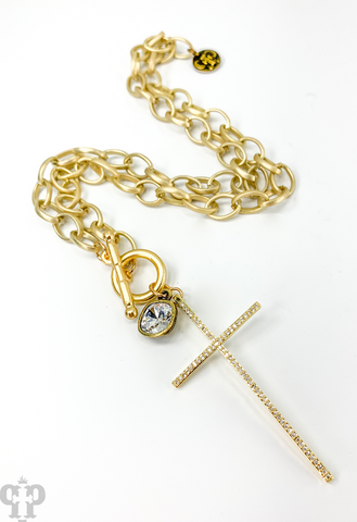 1N435BCL Matte gold toggle front chain with gold pave cross pendant and 8mm bronze/clear cushion cut drop