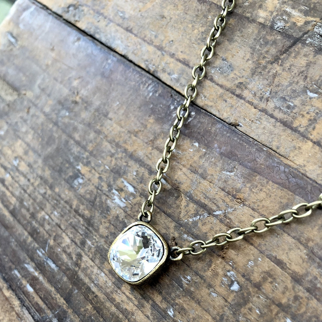 N-341BCLClear Cushion Cut Bronze Necklace