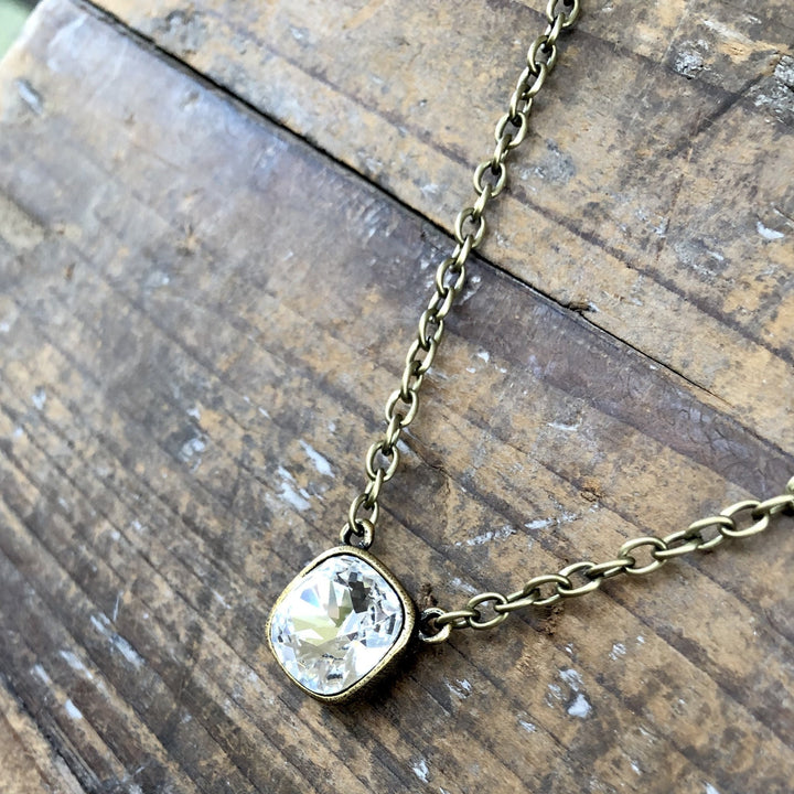 N-341BCLClear Cushion Cut Bronze Necklace
